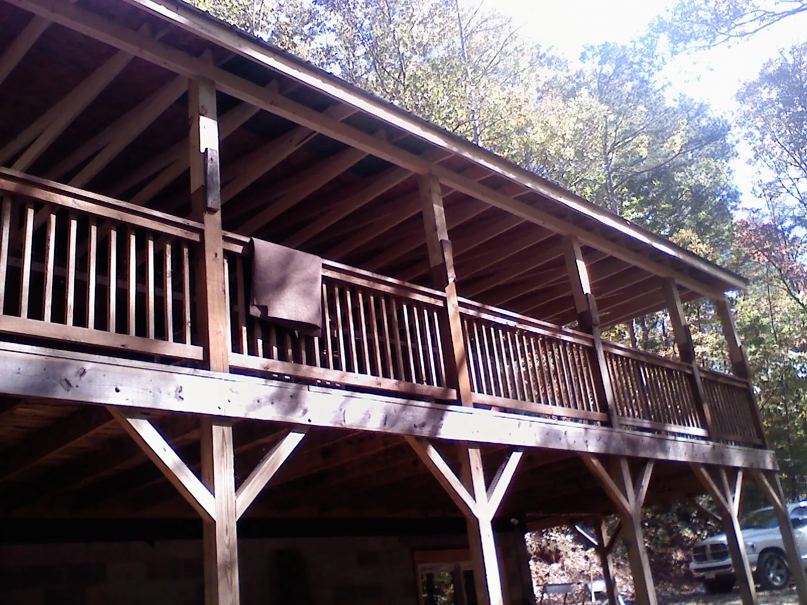 Timber framing under a new elevated porch and deck — Roof Leak Repair in Knob Noster by Roofing Brothers